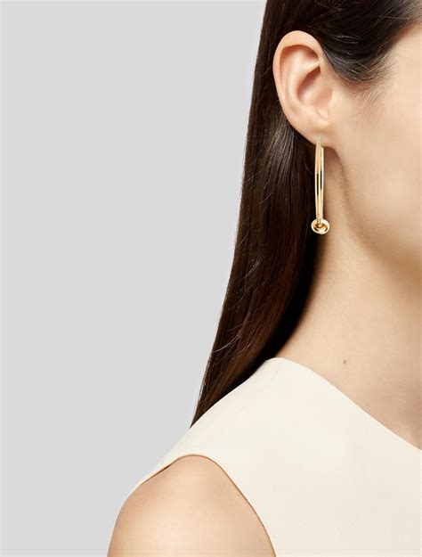 celine knot earring|Celine statement earrings.